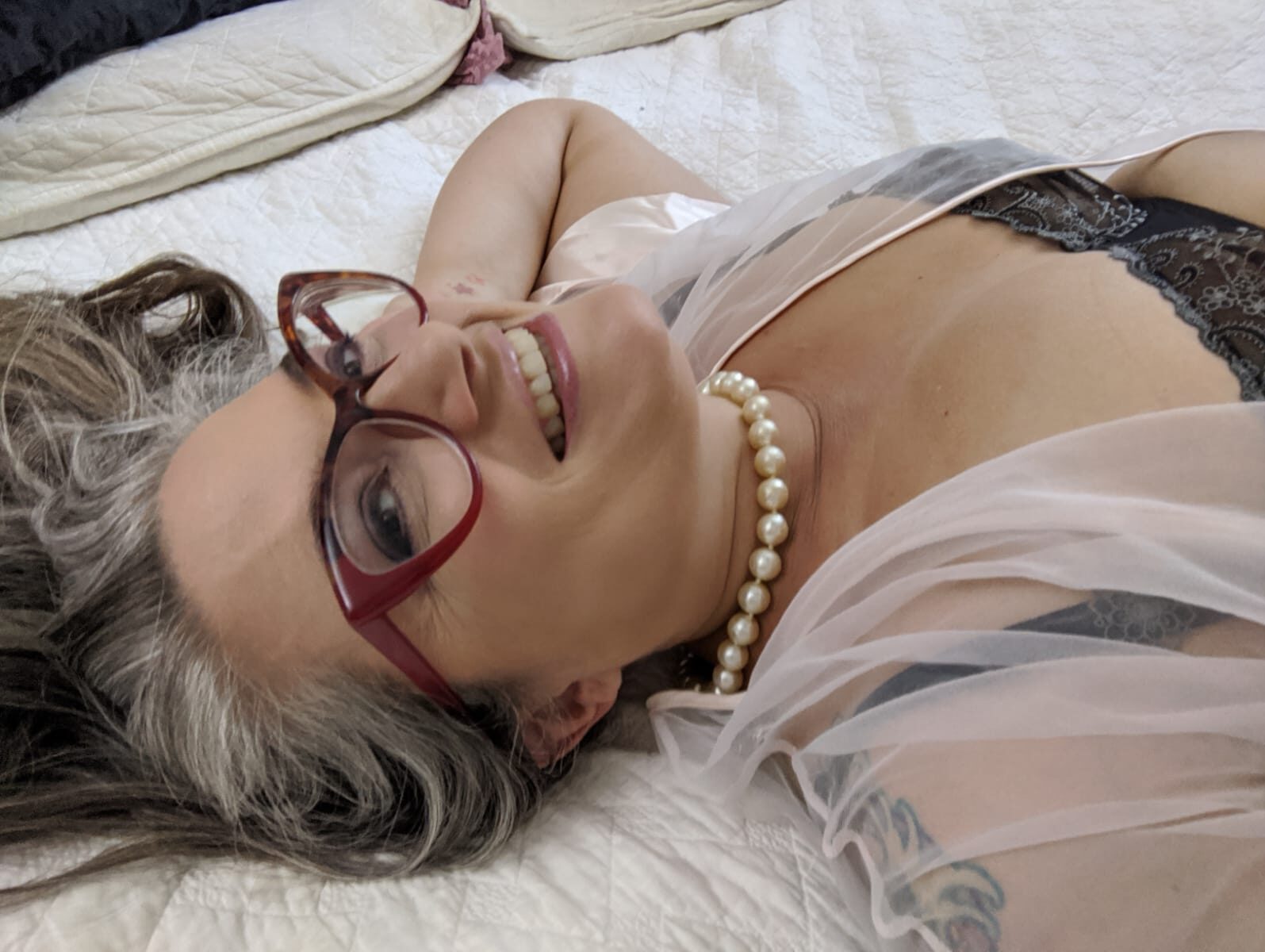 OctoGoddess Devora Moore on bed